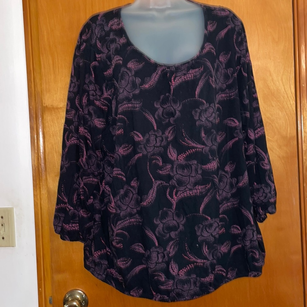 Black top with muted flowers